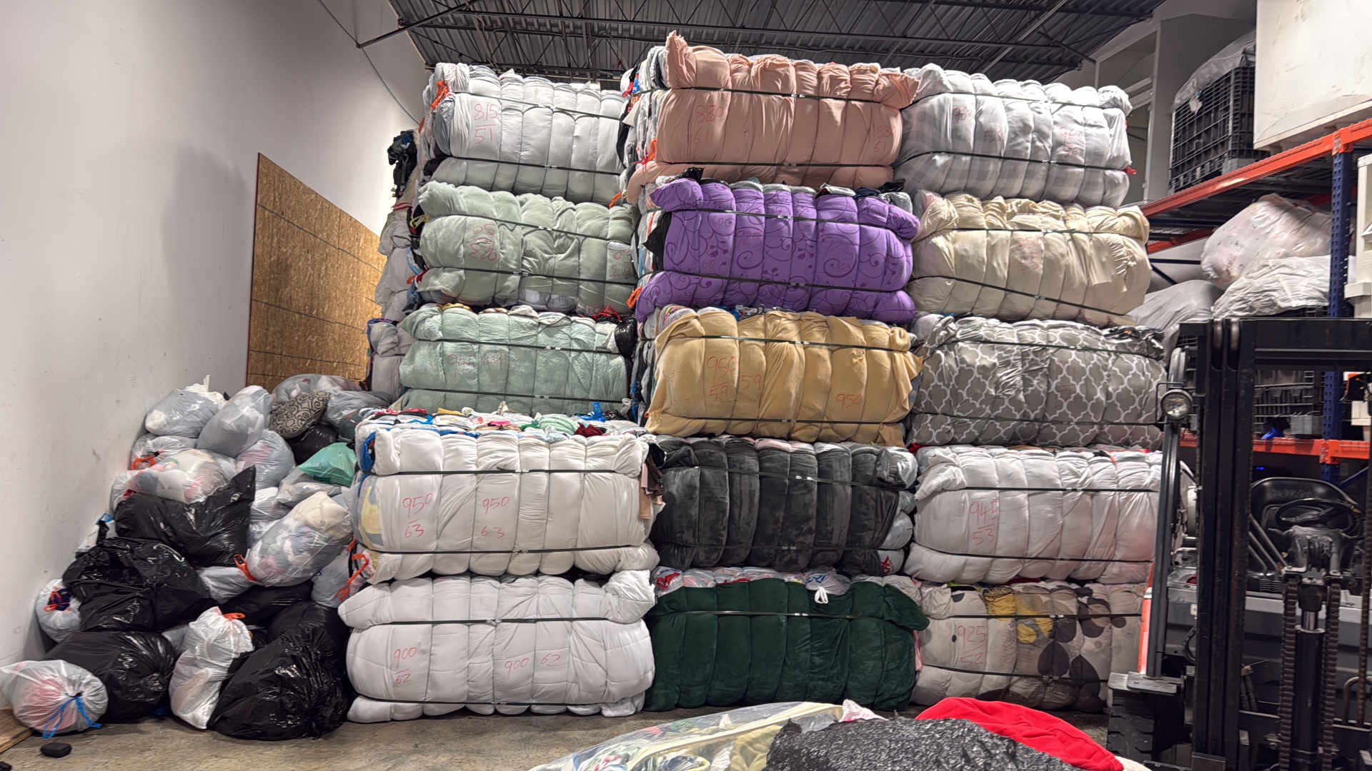 Bales of recycled textiles ready for export